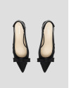 Black, sling-back pumps with frayed fabric