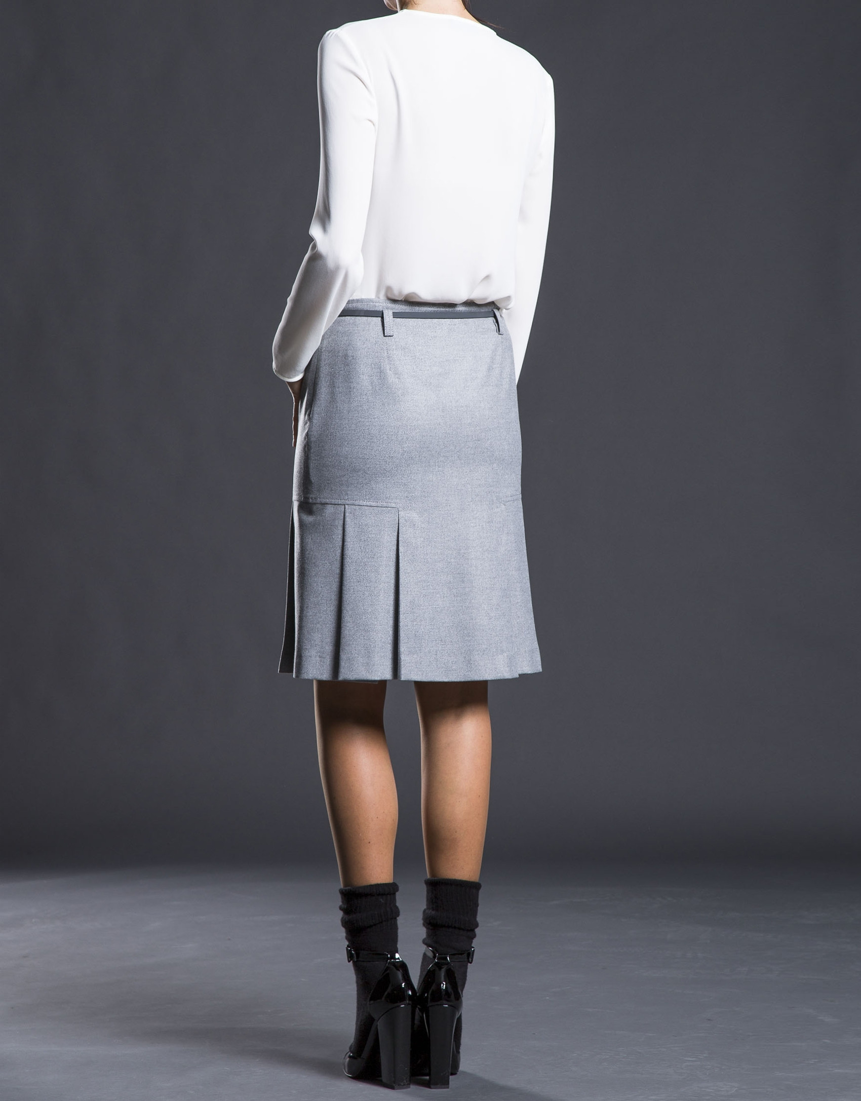 Gray skirt with bottom pleats.