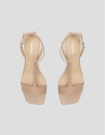 Open sandal with straps in beige leather