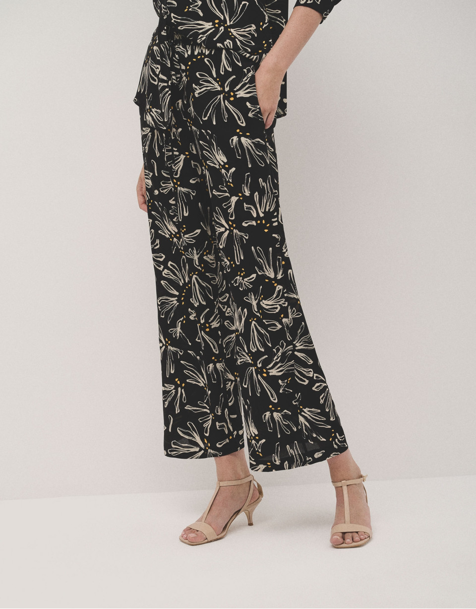 Pantalón palazzo negro estampado flores beige | Roberto Verino
