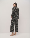 Pantalón palazzo negro estampado flores beige | Roberto Verino