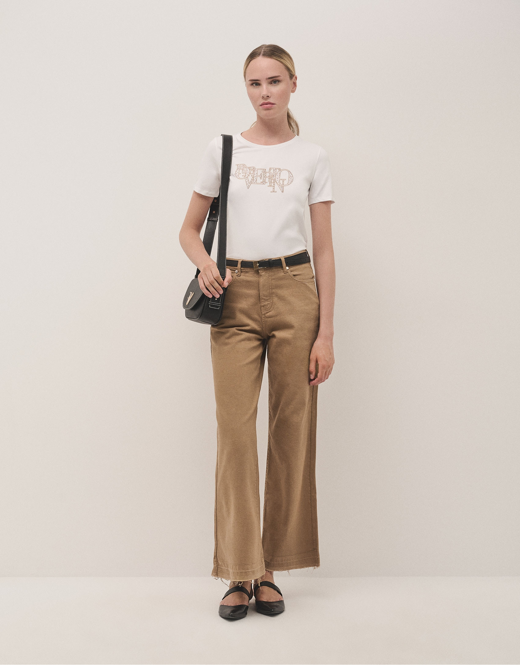 White cotton top with embroidered logo and studs | Roberto Verino