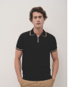 Polo tricotado negro con perfiles blancos | Roberto Verino