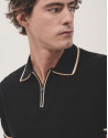Black knitted polo shirt with white outline | Roberto Verino