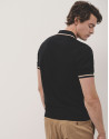 Black knitted polo shirt with white outline | Roberto Verino