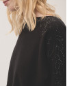 Jersey punto negro con aplicaciones strass en... | Roberto Verino