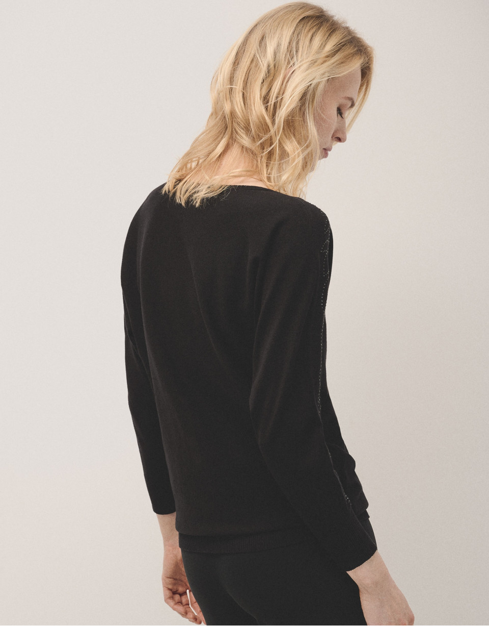 Jersey punto negro con aplicaciones strass en... | Roberto Verino