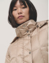 Sand-color quilted coat  - Woman - AW2024 | Roberto Verino