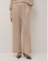 Pantalón ancho en punto brillo beige - Mujer | Roberto Verino