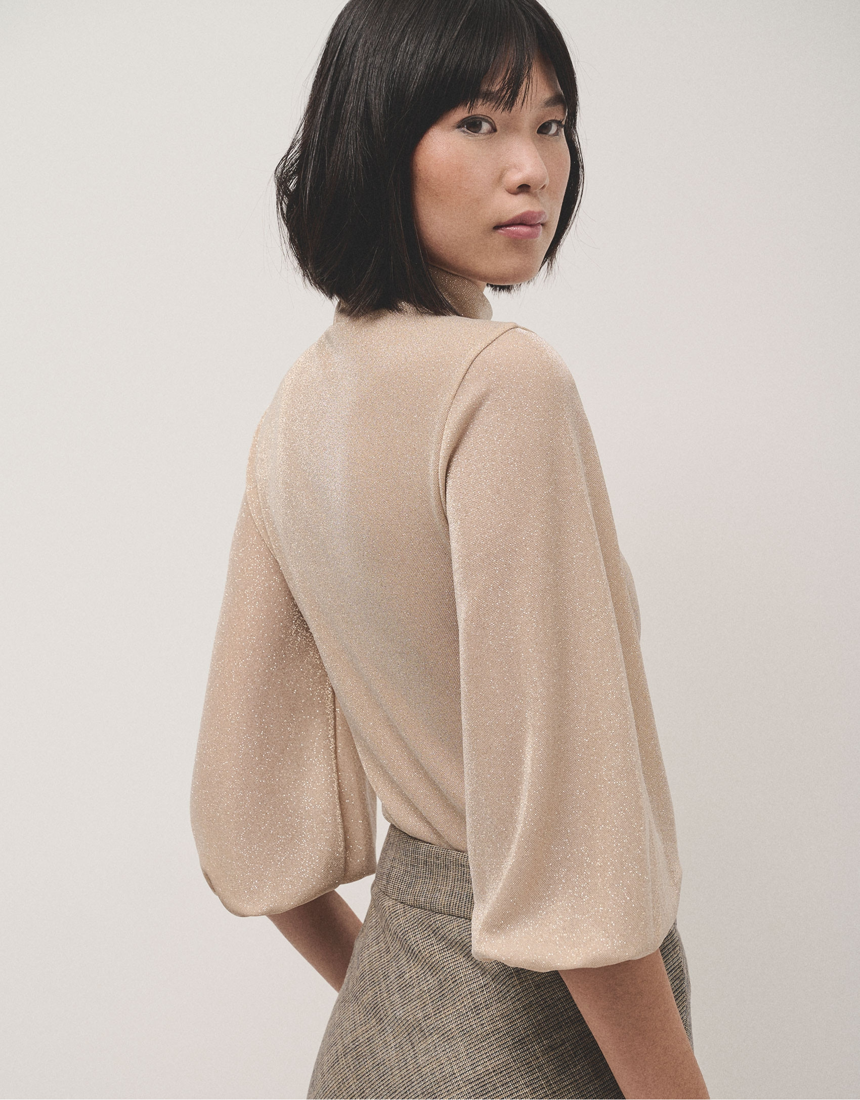 Shiny beige knit top with high collar - Woman | Roberto Verino