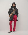 Long black quilted coat with beige interior | Roberto Verino