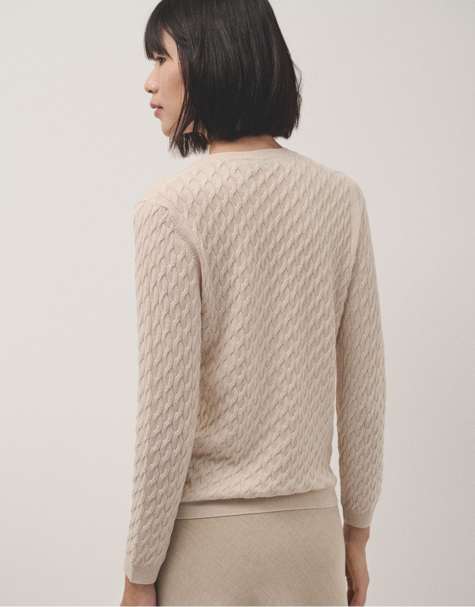 Long sleeves jumper in beige woollen cable-stitch with a front stripe knitted