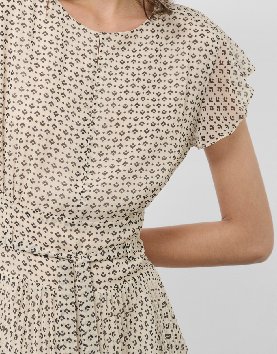 Black and white midi dress with pleats and ... | Roberto Verino