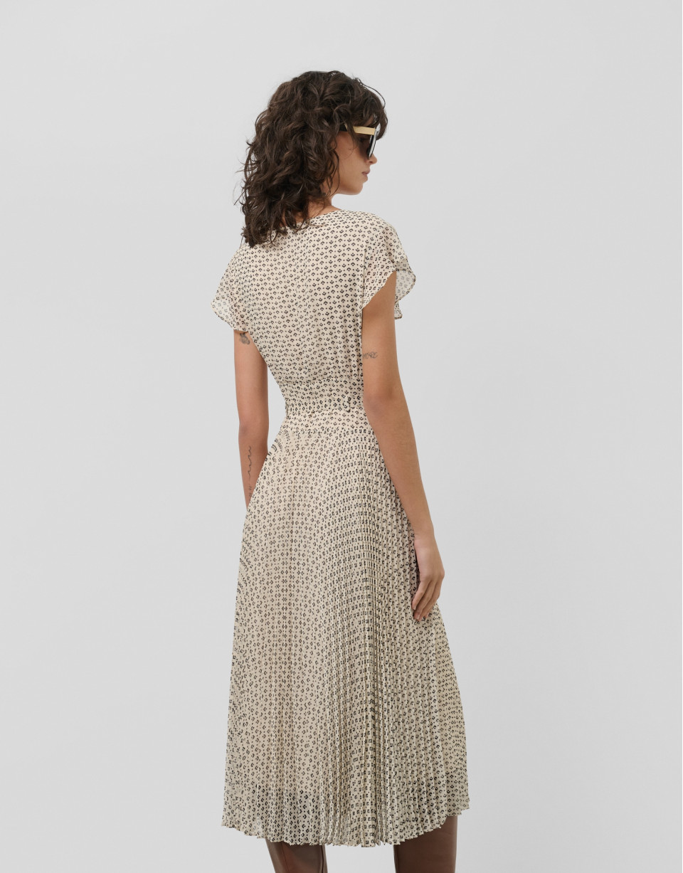 Black and white midi dress with pleats and ... | Roberto Verino