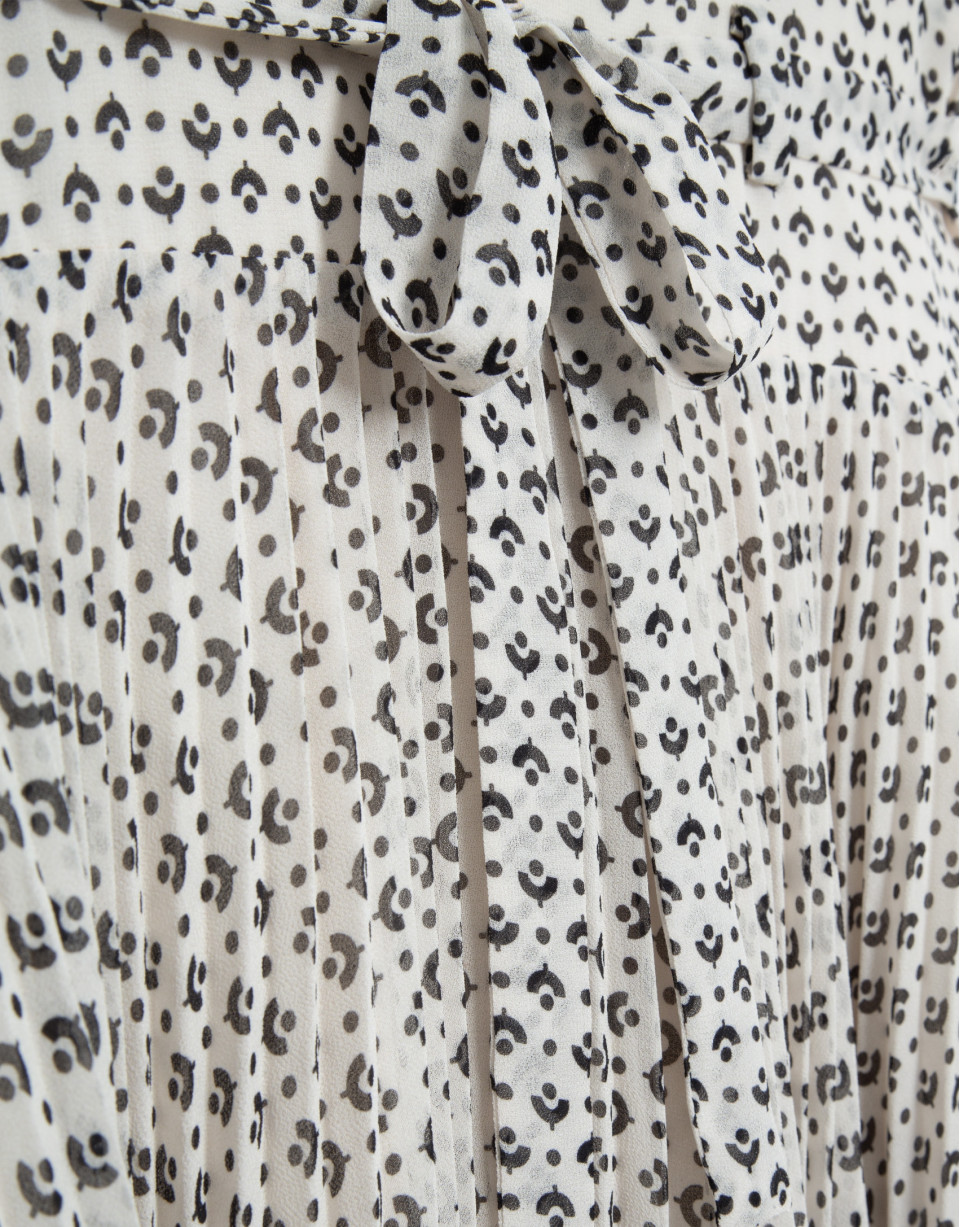 Black and white midi dress with pleats and ... | Roberto Verino
