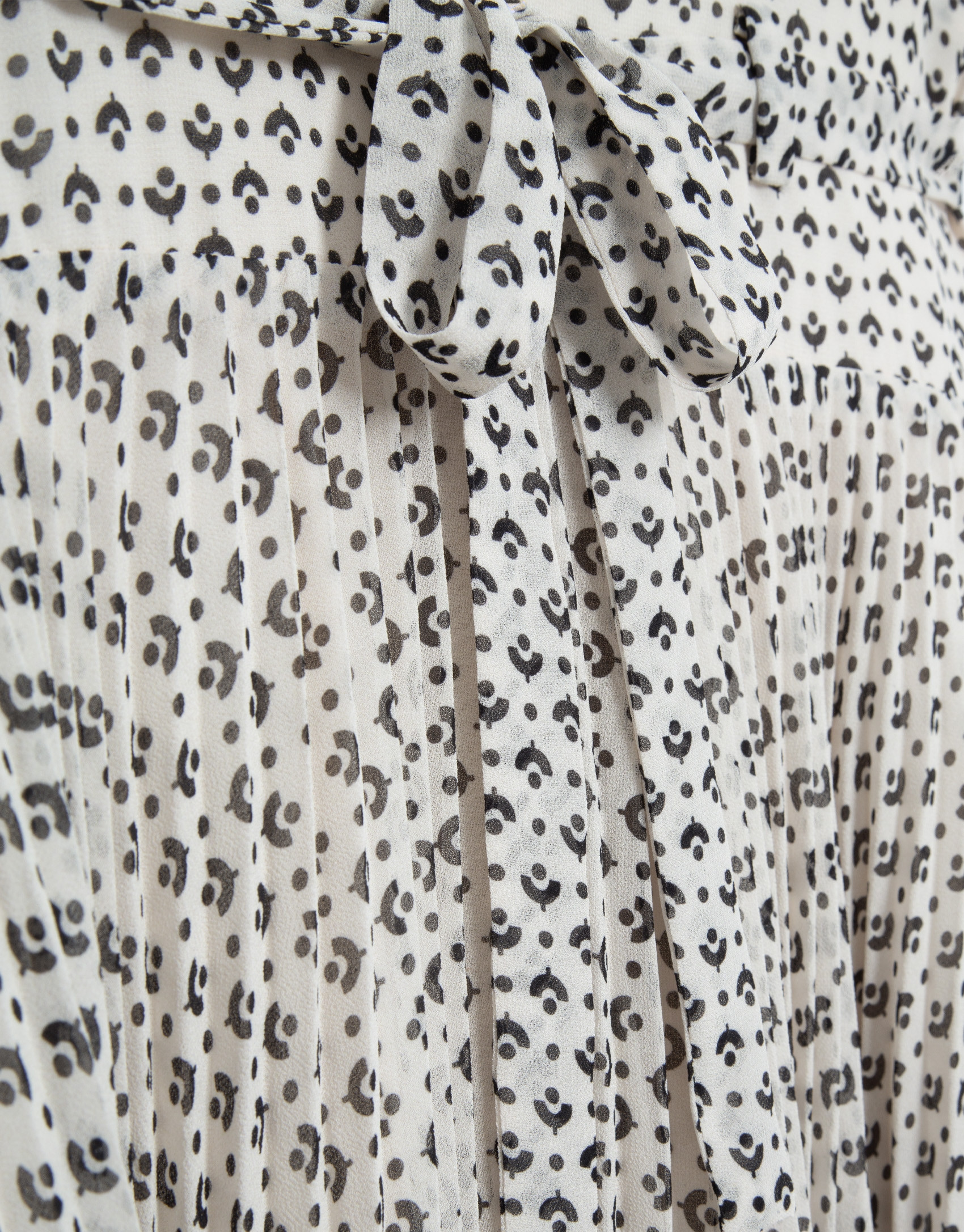 Black and white midi dress with pleats and ... | Roberto Verino