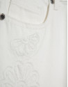 Pantalón vaquero ancho beige con bordados ... | Roberto Verino
