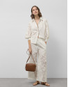 Pantalón palazzo con diseño floral en ... | Roberto Verino