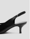 Zapato salón destalonado piel negra con cortes