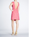 Coral dress with bare back 