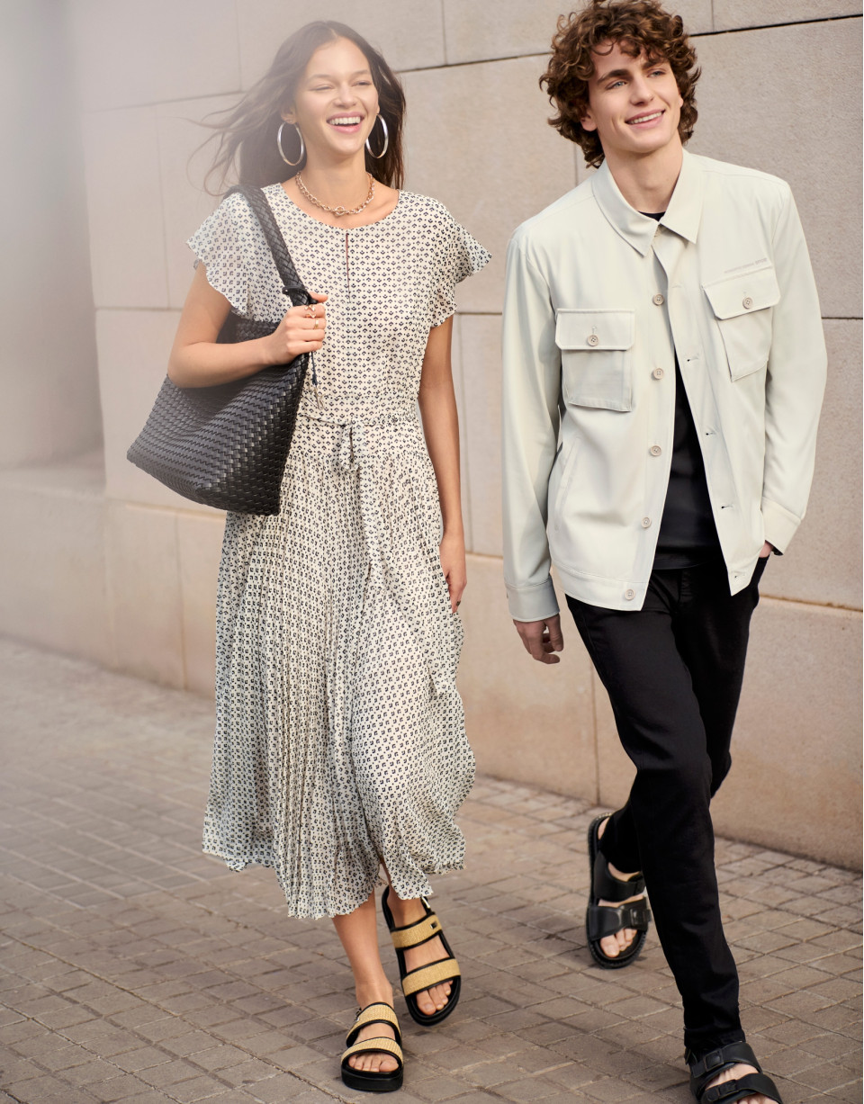 Black and white midi dress with pleats and ... | Roberto Verino