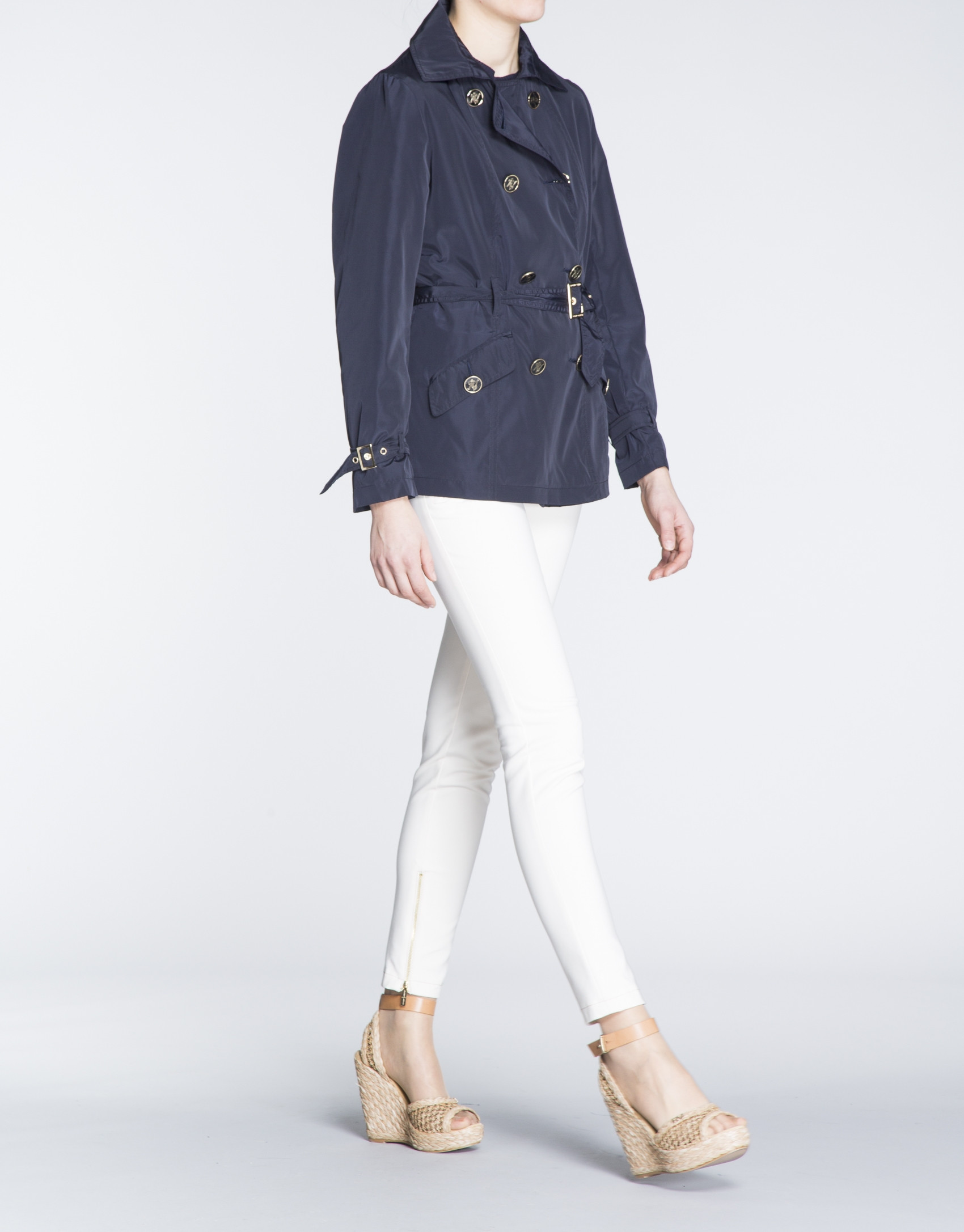Navy blue gabardine with double row of buttons 