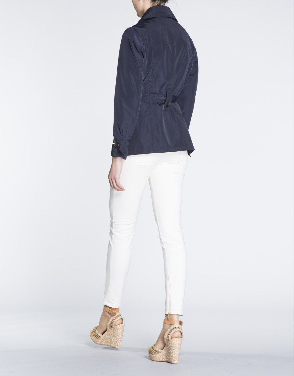 Navy blue gabardine with double row of buttons 