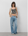 Blue denim cropped top with floral embroidery... | Roberto Verino