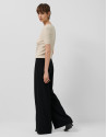 Wide-legged black crepe trousers with slit | Roberto Verino