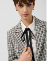 Short black and white tweed jacket with gold ... | Roberto Verino