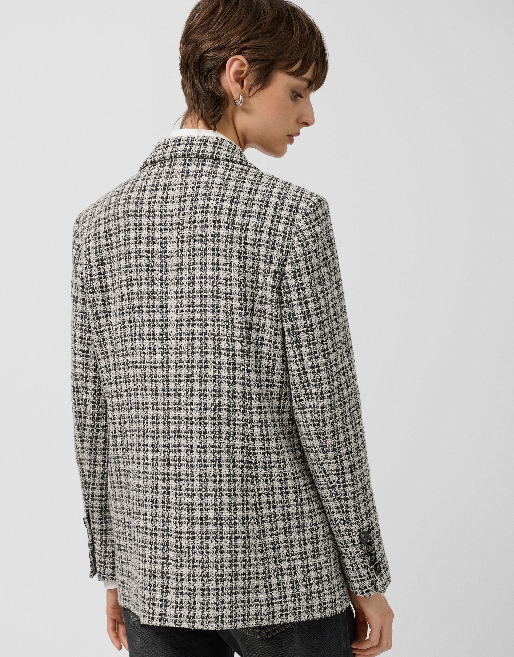 Short black and white tweed jacket with gold ... | Roberto Verino