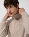 Jersey cuello alto trabajado color arena melange | Roberto Verino