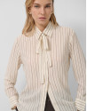 Beige striped shirt with bow at the neck | Roberto Verino