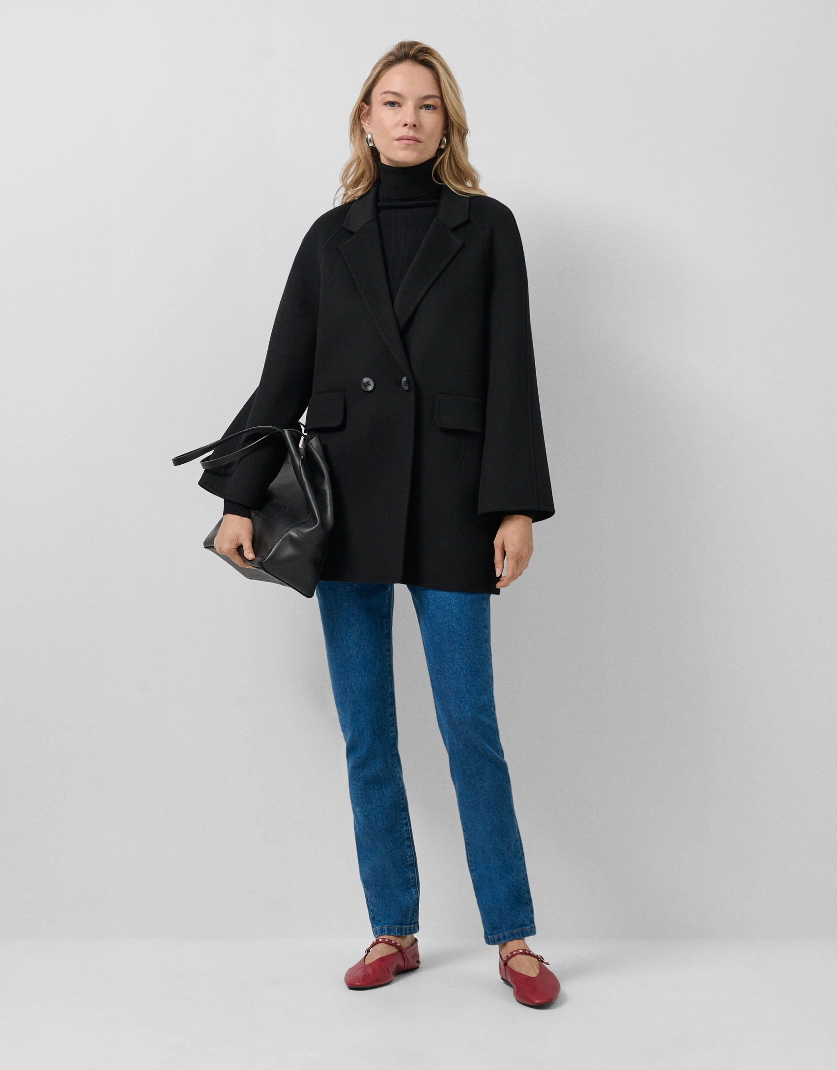 Short three-quarter length double-faced black... | Roberto Verino