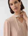 Beige oversized bow-neck blouse - Woman | Roberto Verino