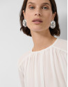 Long-sleeved puffed blouse in ecru crepe | Roberto Verino