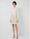 Short skirt in beige weave with fancy thread | Roberto Verino