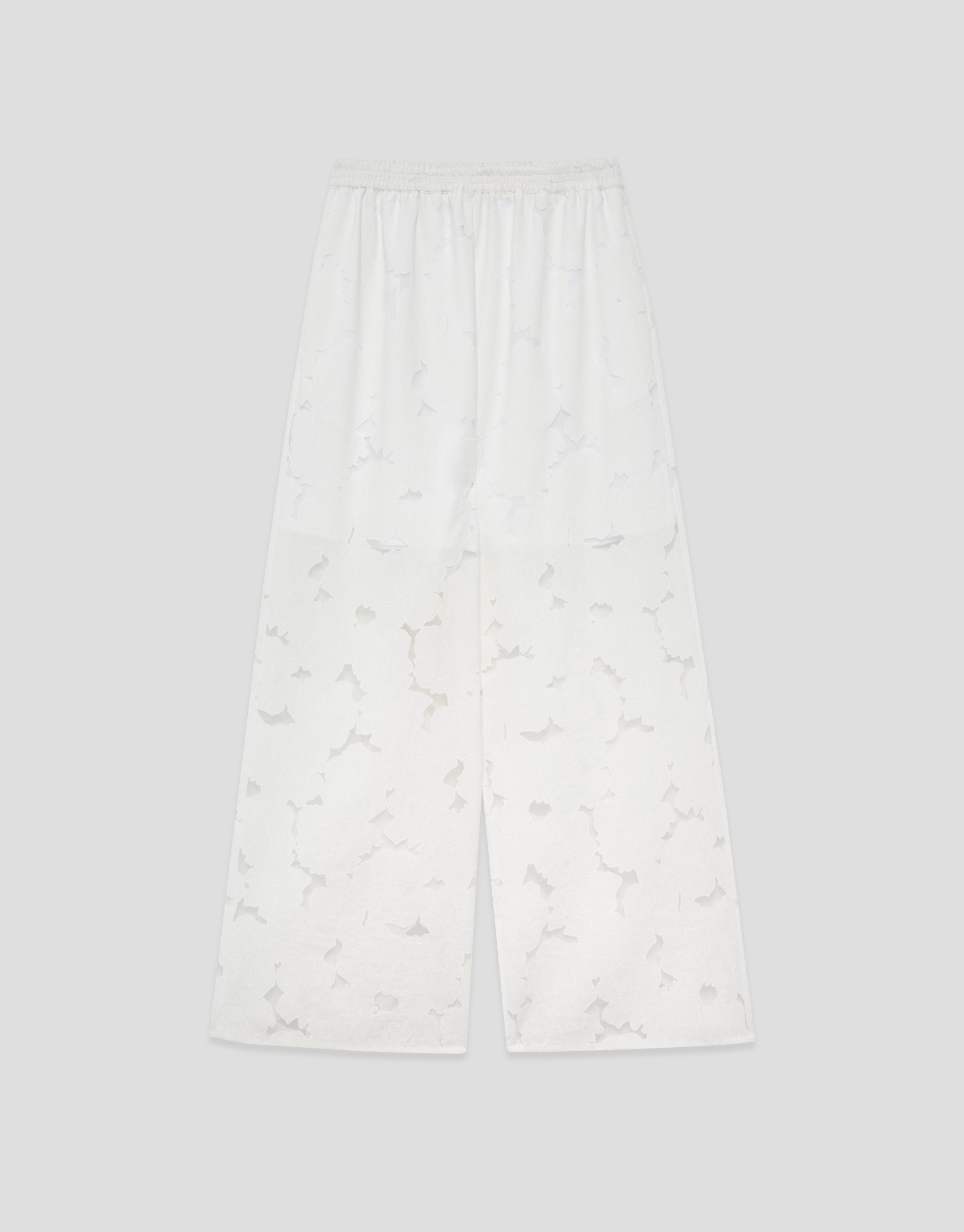 White devoré palazzo trousers with floral print | Roberto Verino