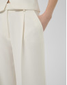 Straight trousers with crepe pleats in ecru | Roberto Verino