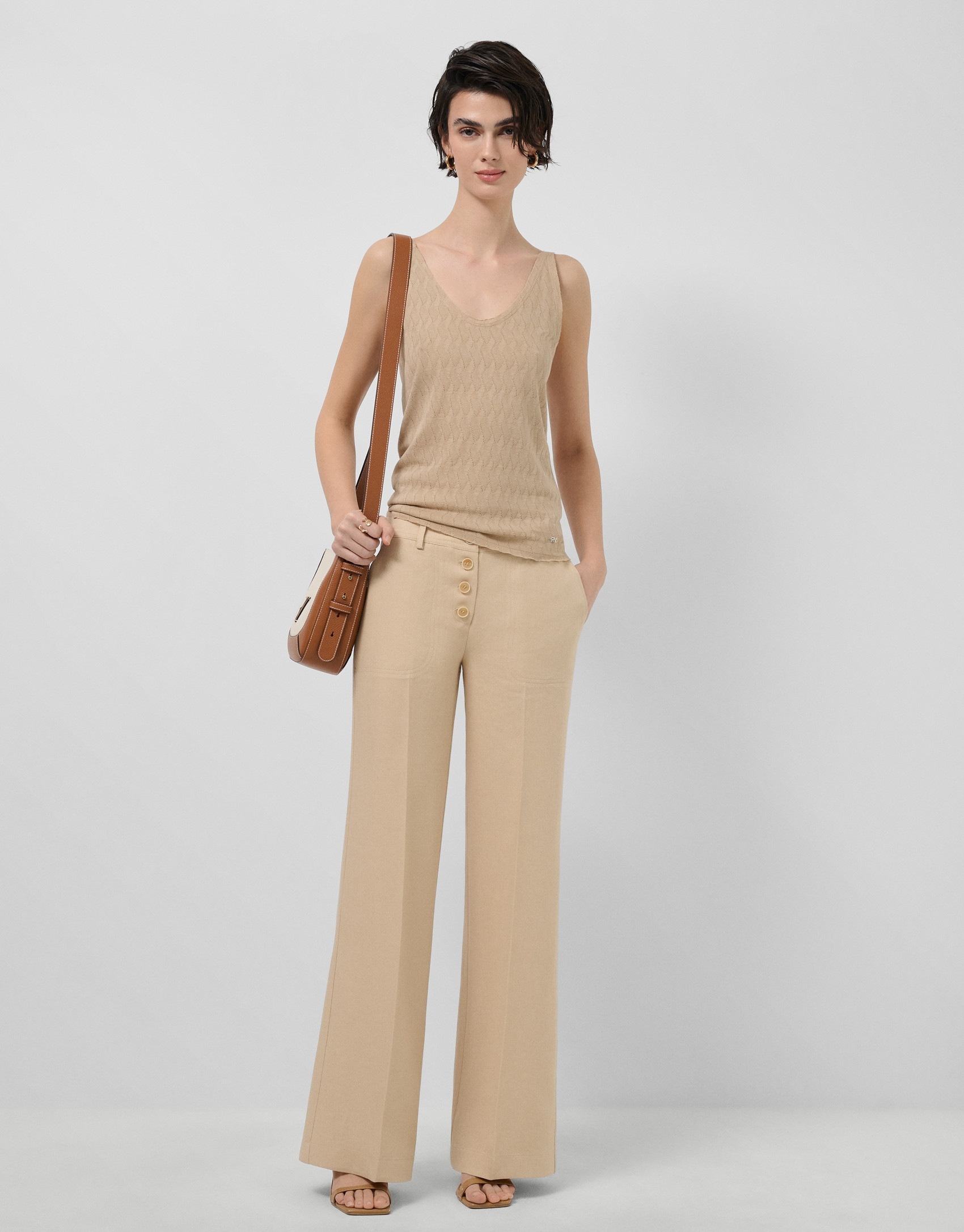Wide-leg trousers with button fastening in ... | Roberto Verino