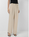 Beige pleated trousers with black pinstripes | Roberto Verino