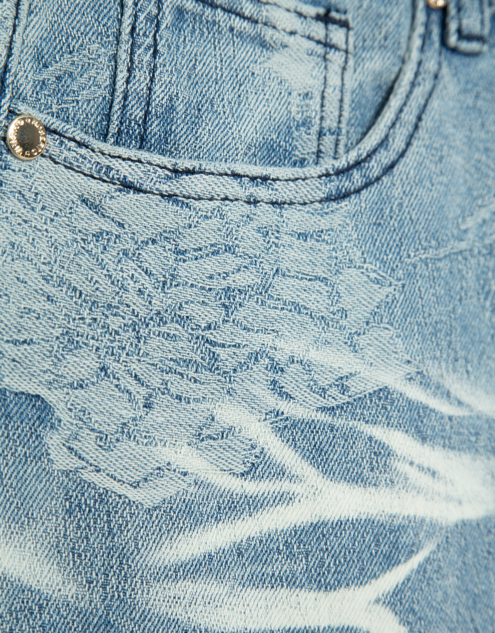 Blue wide-leg jeans with jacquard and faded ... | Roberto Verino
