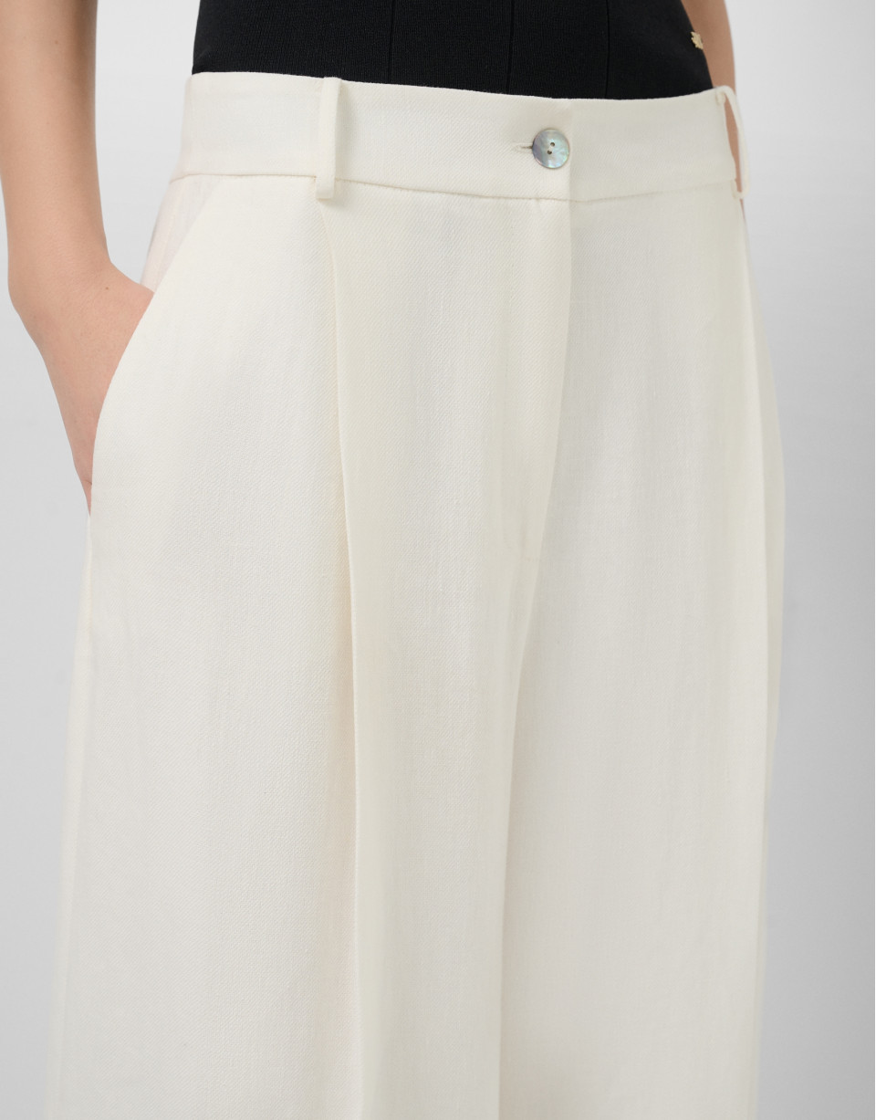 Wide-leg trousers with pleats in off-white ... | Roberto Verino
