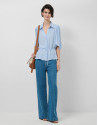 Light blue ruffled sleeve blouse with ... | Roberto Verino