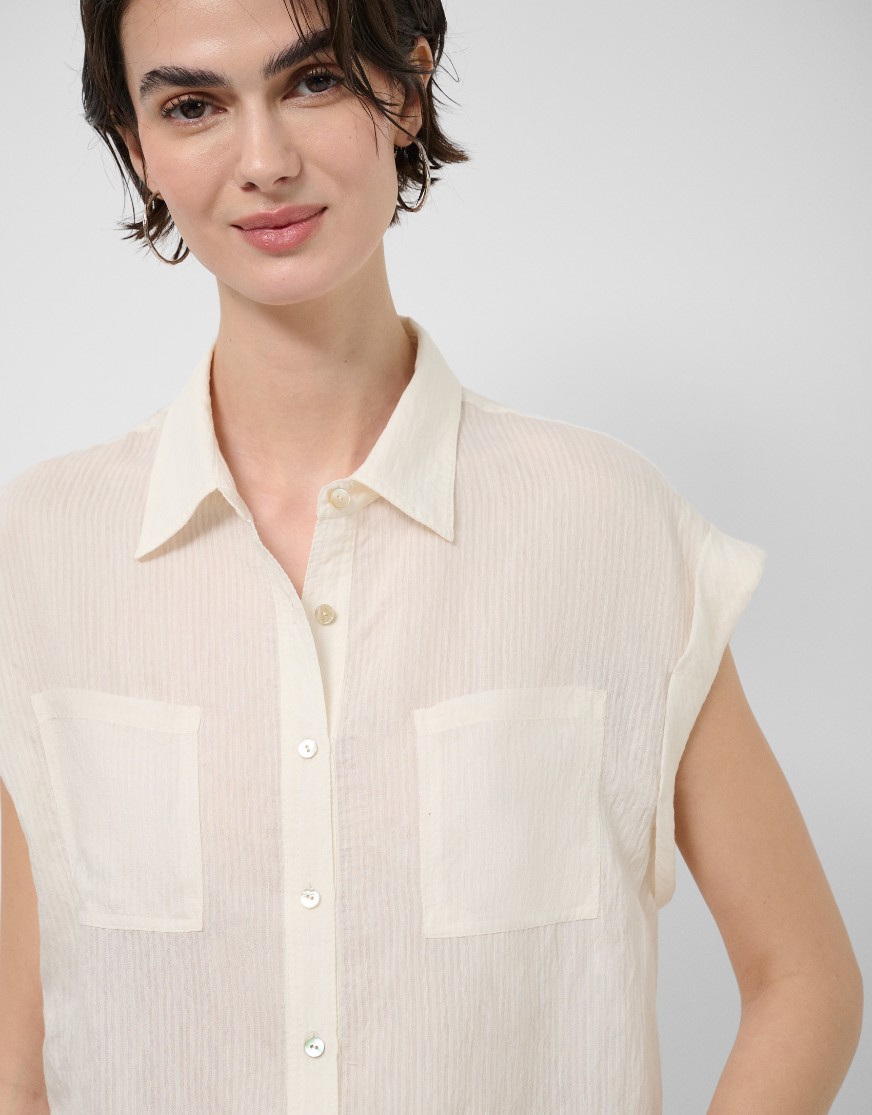 Ecru sleeveless blouse with pockets - Woman | Roberto Verino