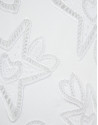 Oversized white sleeveless T-shirt with stars... | Roberto Verino