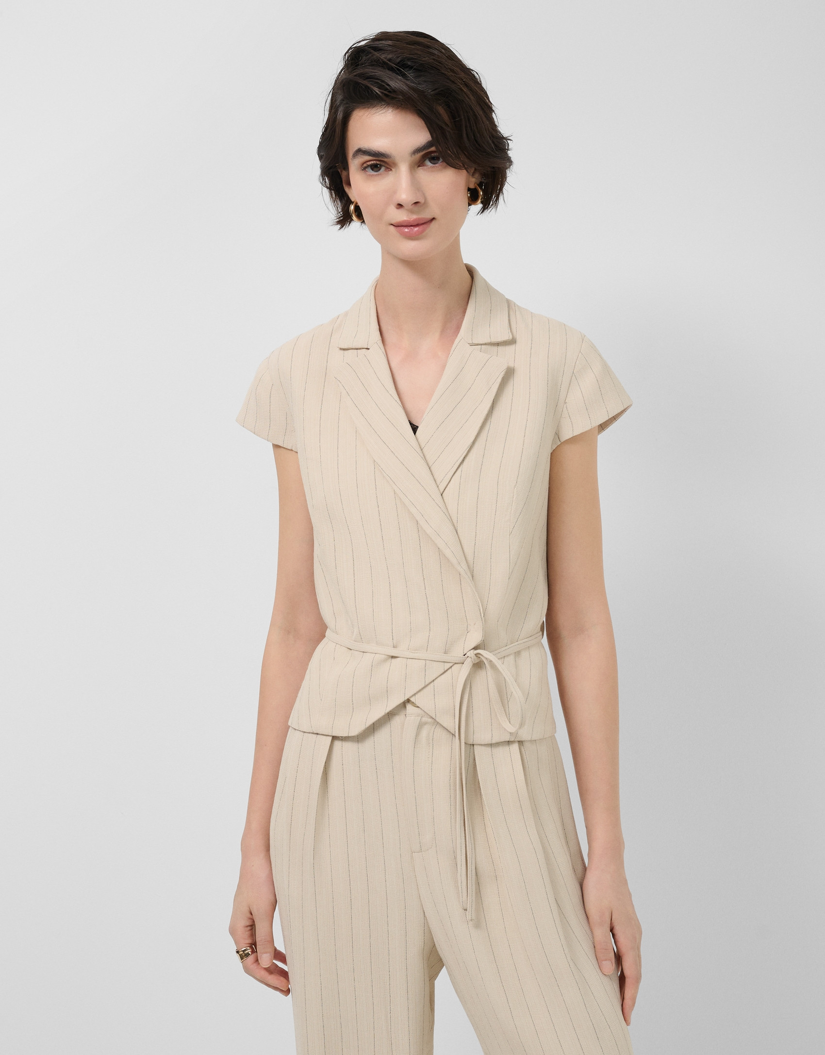 Beige double-breasted waistcoat with black ... | Roberto Verino