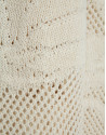 Chaqueta larga beige con calados florales | Roberto Verino