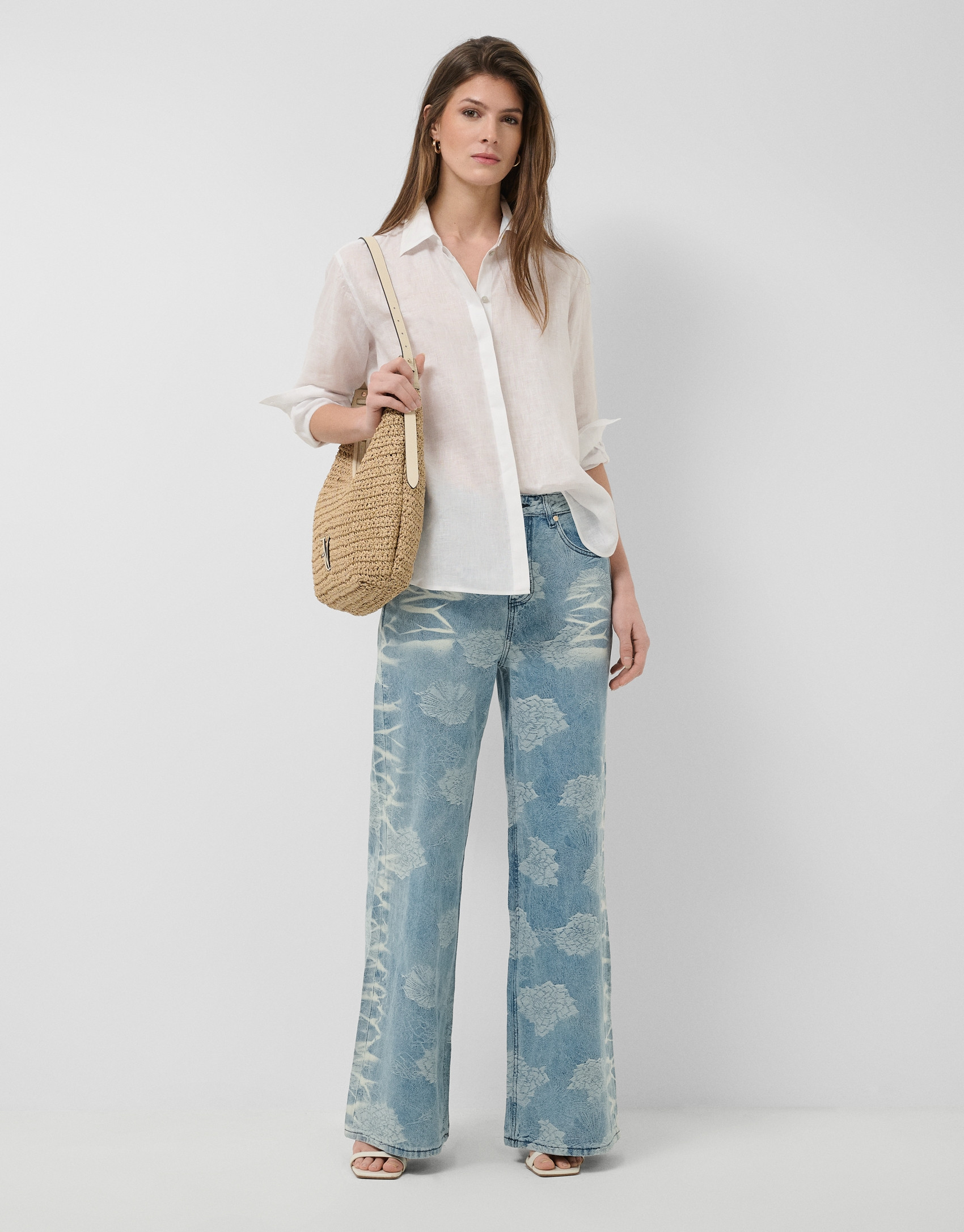 Blue wide-leg jeans with jacquard and faded ... | Roberto Verino