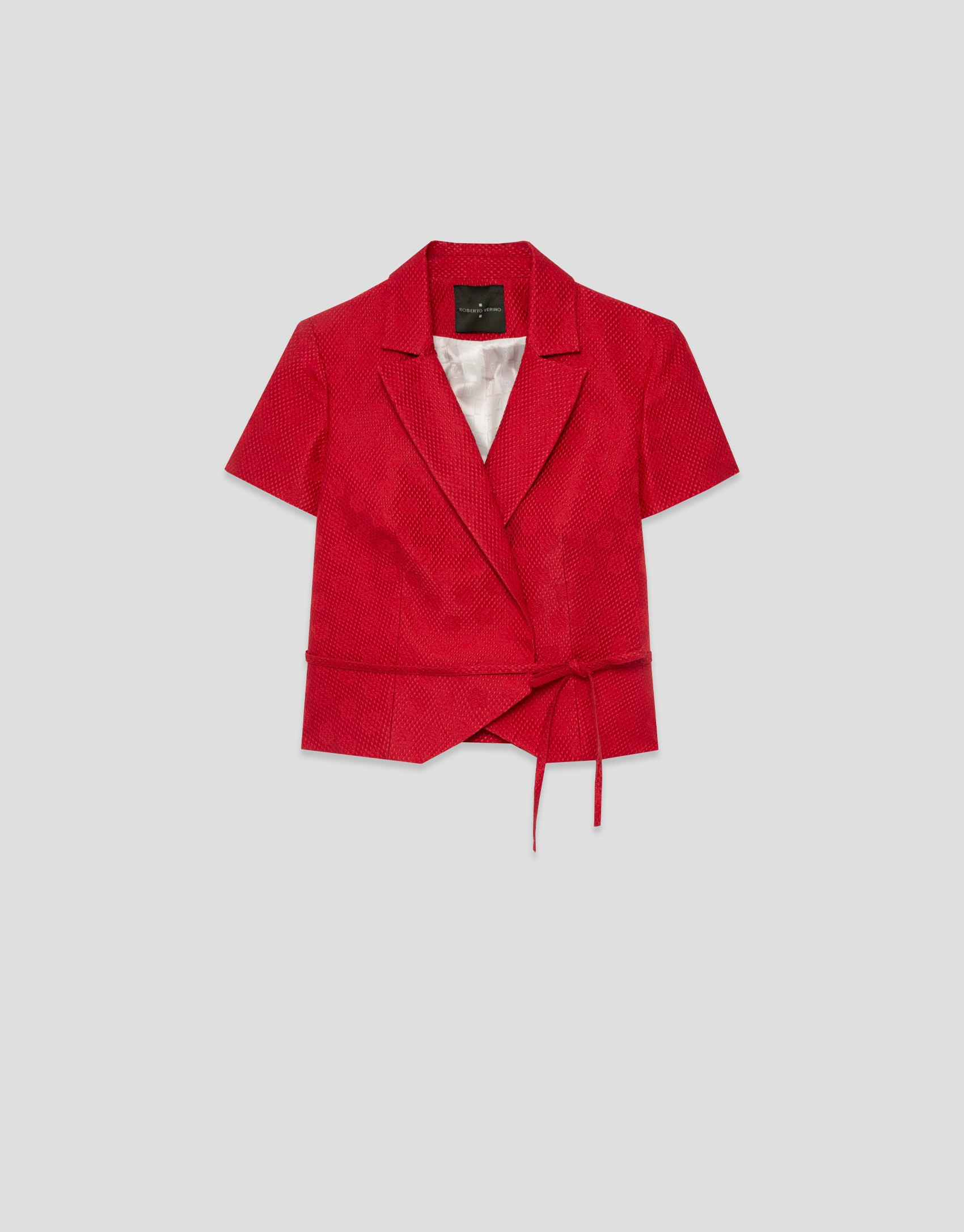 Short sleeveless jacket in red floral piqué ... | Roberto Verino
